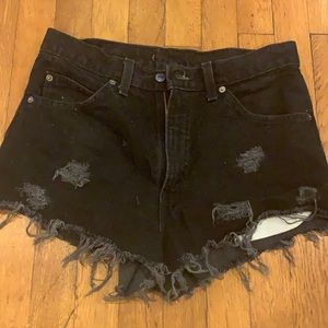 Vintage black Levi’s high waisted jean shorts